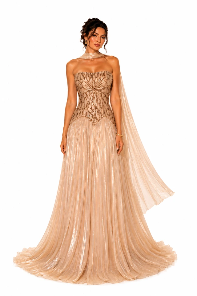 Peach gown with a decorated bodice and a flowing, pleated skirt., photo 1
